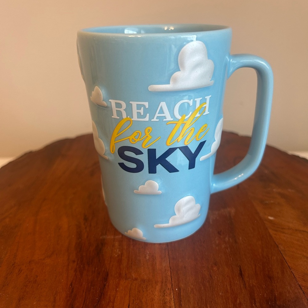 Disney Toy Story Andy's Wallpaper Reach For The Sky Clouds Tall Coffee Mug